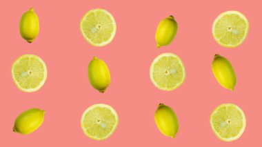 Limonlar renkli bir arkaplanda titriyor. Vejetaryen teması