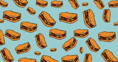 Renkli bir arka planda sandviçler sallanıyor. 