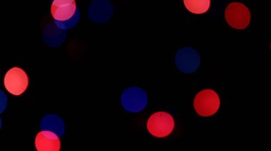 Koyu arkaplanda yanıp sönen ışıklar