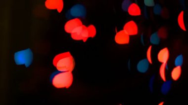 Koyu arkaplanda yanıp sönen ışıklar