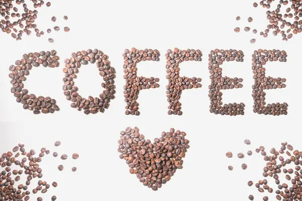 Kaffeetext Mit Liebessymbol Aus Kaffeebohnen Samen — Stockfoto