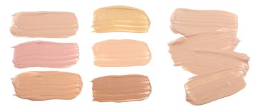 Beyaz arka plan üzerinde izole bej sıvı temel makyaj.