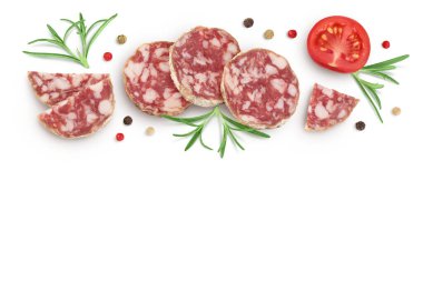 Cured salami sausage slices isolated on white background. Italian cuisine with full depth of field. Top view with copy space for your text. Flat lay