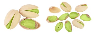 Fıstık, beyaz arka planda tam derinlikte izole edilmiş. Üst Manzara. Düz yatıyordu.