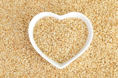 Arka plan olarak susam tohumları. Üst Manzara. Düz yatıyordu.