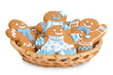 christmas gingerbread cookie in a wicker basket isolated on white background. clipart