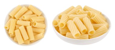 raw italian tortiglioni pasta in ceramic bowl isolated on white background with full depth of field. Top view. Flat lay.