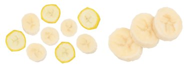 Beyaz zemin üzerinde, geniş bir alana yayılmış muz izole edilmiş. Üst Manzara. Düz yatıyordu