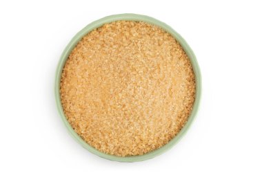 Seramik kasedeki kahverengi şeker beyaz arka planda izole edilmiş. Üst Manzara. Düz yatıyordu.