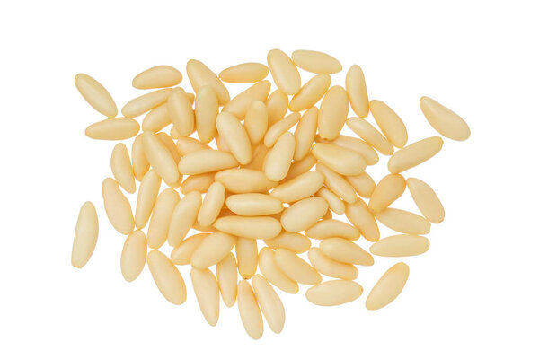 Shelled European pine nuts isolated on white background with full depth of field. Top view. Flat lay.