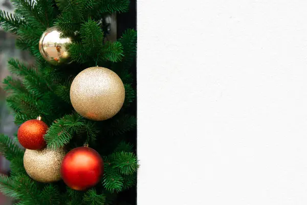 advertisement composition with empty space for your text on background texture near evergreen Christmas decoration tree traditional colorful balls winter holidays eve season time