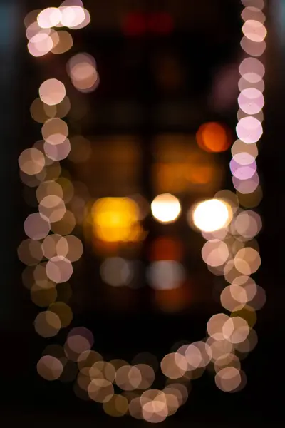 Christmas Abstraction Bokeh Unfocused Vertical Picture Dark Garland Light Effect — Stock Photo, Image