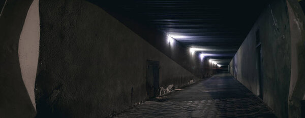 Night back street alley underground tunnel grunge and dirty dangerous city place panoramic view with electric lamp illumination effect