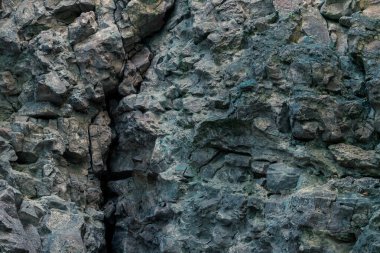 Keskin kaya mağarası taşı yüzeysel soğuk ışık arkaplan deseni