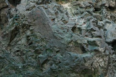 Soğuk taş desenli basit arka plan doğal granit keskin manzara yüzeyi.