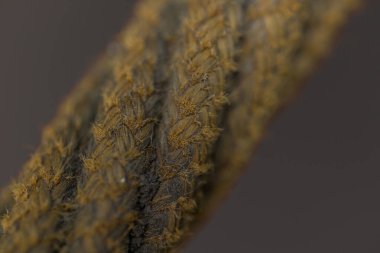 makro iplik kirli kumaş desenli ip yakın yüzey eski deniz cisimleri bulanık arkaplan alanı dar odak kavramı üzerinde izole görünüm