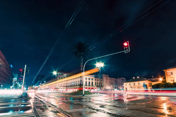light trails of tram in the city at night
