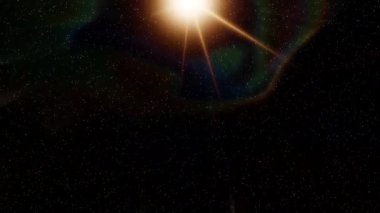 Soyut hareket arkaplanı renkli parçacıklar parlıyor. Kusursuz 4K döngü videosu.