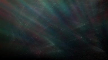 Soyut hareket arkaplanı renkli parçacıklar parlıyor. Kusursuz 4K döngü videosu.