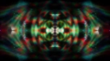 Soyut hareket arkaplanı renkli parçacıklar parlıyor. Kusursuz 4K döngü videosu.