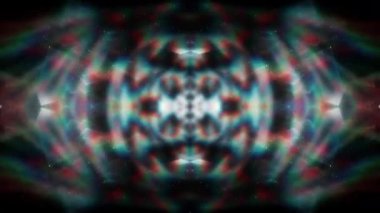 Soyut hareket arkaplanı renkli parçacıklar parlıyor. Kusursuz 4K döngü videosu.