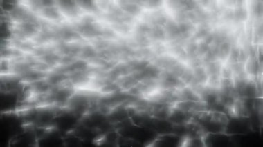 Soyut hareket arkaplanı renkli parçacıklar parlıyor. Kusursuz 4K döngü videosu.