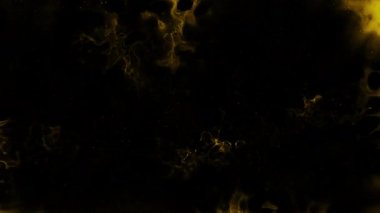 Soyut hareket arkaplanı renkli parçacıklar parlıyor. Kusursuz 4K döngü videosu.