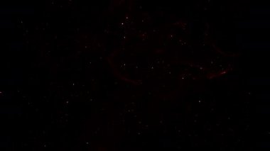 Soyut hareket arkaplanı renkli parçacıklar parlıyor. Kusursuz 4K döngü videosu.