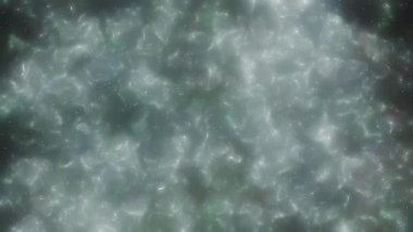 Soyut hareket arkaplanı renkli parçacıklar parlıyor. Kusursuz 4K döngü videosu.