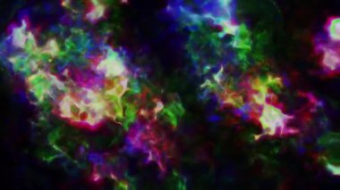 Soyut hareket arkaplanı renkli parçacıklar parlıyor. Kusursuz 4K döngü videosu.