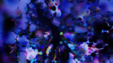 Soyut hareket arkaplanı renkli parçacıklar parlıyor. Kusursuz 4K döngü videosu.