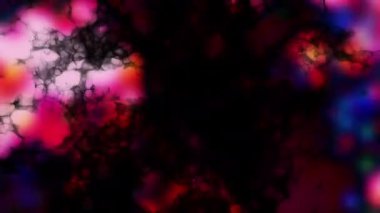 Soyut hareket arkaplanı renkli parçacıklar parlıyor. Kusursuz 4K döngü videosu.