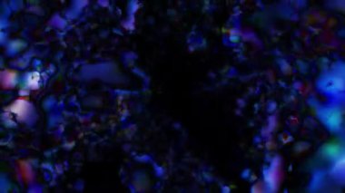 Soyut hareket arkaplanı renkli parçacıklar parlıyor. Kusursuz 4K döngü videosu.