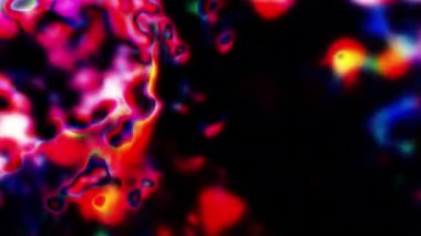 Soyut hareket arkaplanı renkli parçacıklar parlıyor. Kusursuz 4K döngü videosu.