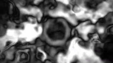 Soyut hareket arkaplanı renkli parçacıklar parlıyor. Kusursuz 4K döngü videosu.