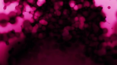 Soyut hareket arkaplanı renkli parçacıklar parlıyor. Kusursuz 4K döngü videosu.