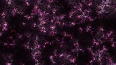 Soyut hareket arkaplanı renkli parçacıklar parlıyor. Kusursuz 4K döngü videosu.