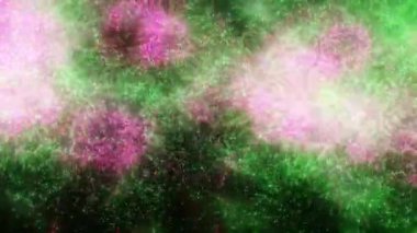 Soyut hareket arkaplanı renkli parçacıklar parlıyor. Kusursuz 4K döngü videosu.