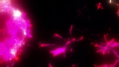 Soyut hareket arkaplanı renkli parçacıklar parlıyor. Kusursuz 4K döngü videosu.
