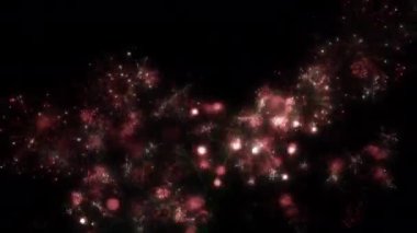 Soyut hareket arkaplanı renkli parçacıklar parlıyor. Kusursuz 4K döngü videosu.