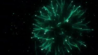 Soyut hareket arkaplanı renkli parçacıklar parlıyor. Kusursuz 4K döngü videosu.