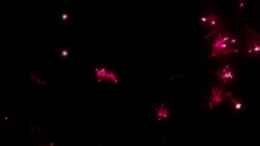 Soyut hareket arkaplanı renkli parçacıklar parlıyor. Kusursuz 4K döngü videosu.