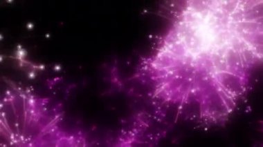 Soyut hareket arkaplanı renkli parçacıklar parlıyor. Kusursuz 4K döngü videosu.