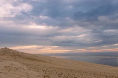 The Dune of Pilat, also called Grande Dune du Pilat, is the tallest sand dune in Europe. It is located in La Teste-de-Buch in the Arcachon Bay area, France, 60 km southwest of Bordeaux. 