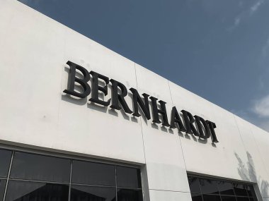 Tangerang, Indonesia - May 13, 2024: Bernhardt furniture company logo on a building wall at Indonesian Design District (IDD), a hub area for design and furniture enthusiast located in PIK 2. clipart