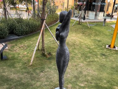 Tangerang, Indonesia - May 13, 2024: Abstract statue found in Indonesian Design District (IDD), a hub area for design and furniture enthusiast located in PIK 2. Shot during day time clipart