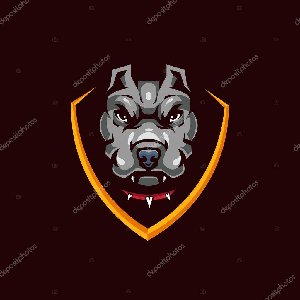 Pitbull Head in Shield Mascot Logo for Sport and Gaming isolated on dark Background