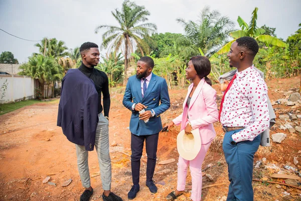 Entrepreneurs discuss buying land in Africa, business people meeting