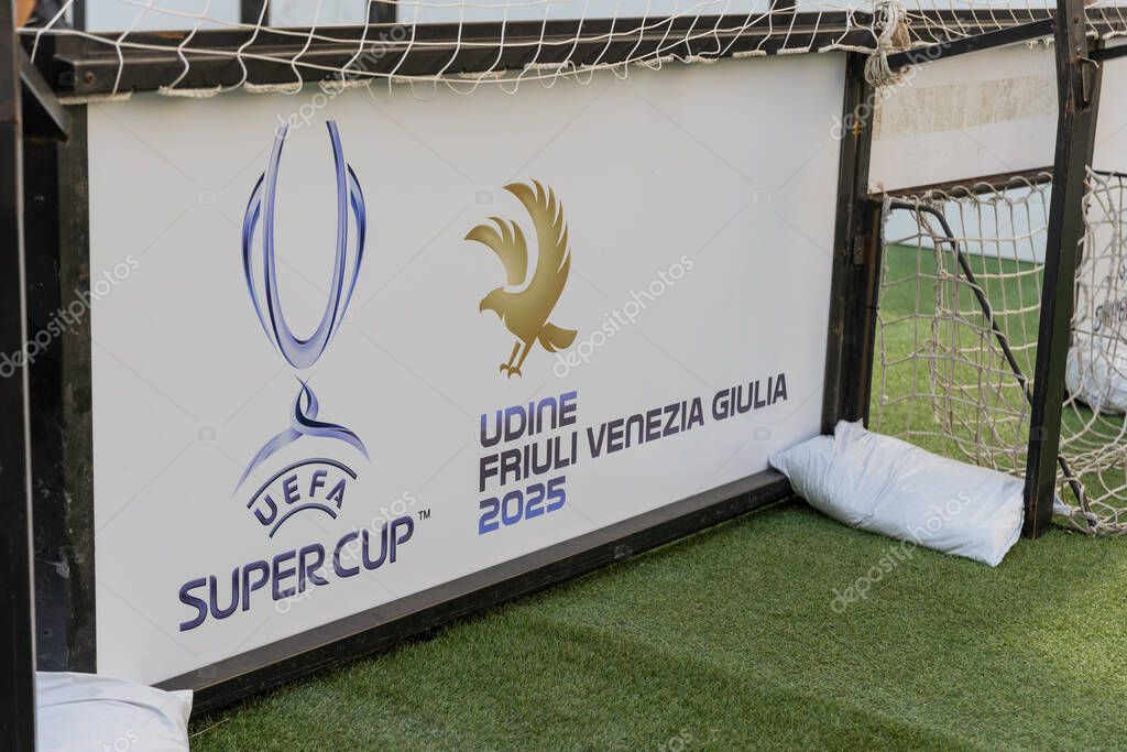 Close-up of European Super Cup advertising display in Udine city center