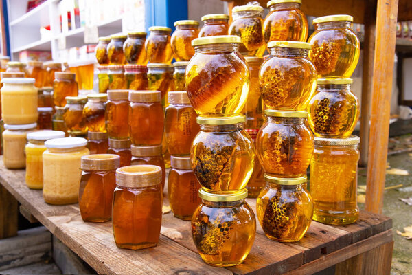 Gabala. Azerbaijan. 10.31.2021. Glass jars filled with different types of honey. 